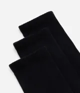 Kit de tres pares de medias deportivas largas de algodón blanco.