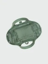 Bolso Longchamp modelo Le Roseau XS, color verde agua, con doble asa corta y correa larga extraíble.