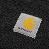 Gorro de lana negro con logo de Carhartt bordado en etiqueta blanca.