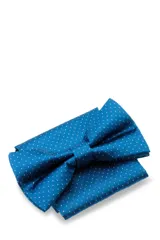 Conjunto de moña y pañuelo a juego en color morado, diseñado para complementar indumentaria formal.