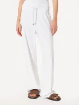Pantalón largo blanco de punto de algodón pima con elastano, corte recto, cintura elástica con cordón ajustable y logo bordado.