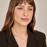 Conjunto de collar y aros de plata 925 con dije de circonia engarzada.