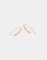 Aros colgantes largos de metal dorado con strass.