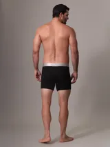 Pack de tres bóxer negros Calvin Klein de microfibra con cintura elástica plateada con el logo de la marca.