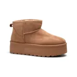 Botas cortas negras de gamuza sintética, con plataforma gruesa y tirador trasero.
