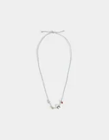 Pulsera de hilo de lurex color celeste con dijes dorados: herradura, trébol de cuatro hojas, ojo turco y corazón.