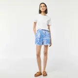 Short de gasa de algodón color celeste con estampado all over en blanco.