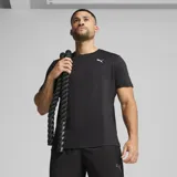 Remera deportiva Puma Ess Poly para hombre, color negro con logo blanco estampado en el pecho.