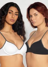 Soutien de microfibra sin costura, preformado con copa y aro. Bretel regulable, con contorno de puntitos blancos y negros.