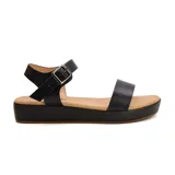 Sandalias negras de plataforma con dos tiras anchas y hebilla en el tobillo.