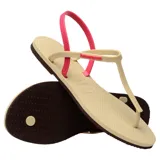Ojotas Havaianas You Paraty FC color beige con tira trasera rosa.