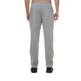 Pantalón de jogging azul marino de Puma, con logo blanco estampado en el muslo izquierdo. Confeccionado en tejido de punto de algodón y poliéster, con cintura elástica ajustable con cordón, bolsillos laterales y puños elásticos.