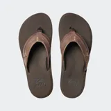 Ojotas Reef color marrón con plantilla de EVA cepillada y suela de goma.