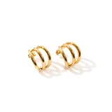 Caravanas de acero enchapado en oro, con diseño de tres aros entrelazados.