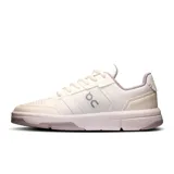 Championes urbanos blancos con detalles en gris y lila, de cuero sintético y suela de goma.