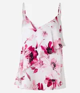 Blusa de viscosa satinada con estampado floral, breteles finos ajustables, escote en pico y volado diagonal.
