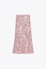 Falda larga de tiro alto con cintura elástica y tejido plisado con estampado floral en tonos rosa y lila.