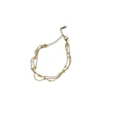 Pulsera dorada de acero quirúrgico con triple cadena y cuentas.