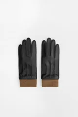 Guantes cortos negros de efecto piel con puño de lana marrón.