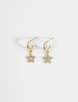 Aros tipo argolla de acero quirúrgico hipoalergénico, color dorado, con dije colgante de estrella calada incrustada con strass.