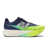 Championes de running New Balance FuelCell SC Elite V5 para mujer, con capellada de malla en tonos azul marino, verde lima y verde menta. Presenta el logo "N" plateado y la inscripción "SC Elite" en el talón. La entresuela es gruesa, de color crema, con detalles degradados en la parte delantera.