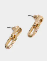 Aros colgantes cortos bañados en oro con cubic zirconia, con forma de eslabón alargado.