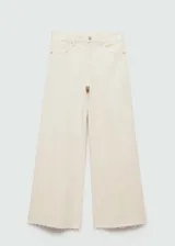 Jeans color crudo de corte culotte, tiro medio y largo cropped.