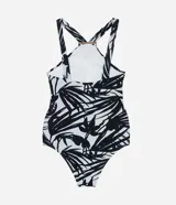 Malla enteriza de microfibra estampada con diseño de follaje en blanco y negro, con escote halter y detalle de aro dorado.