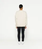 Suéter oversize negro con parche de fieltro con el logo de béisbol de 10DAYS en el pecho, cuello redondo de punto acanalado y puños y dobladillo de punto acanalado.