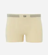 Calzoncillo bóxer color beige, confeccionado en poliamida, con cintura elástica a rayas y logo de la marca.