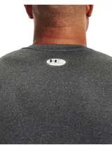 Remera deportiva Under Armour HeatGear de manga corta, color azul marino, con logo blanco en el pecho. Corte ajustado y tejido transpirable. Ideal para entrenamiento.