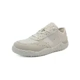 Zapatillas urbanas Paddock Extremes color beige, con suela texturizada y cordones.
