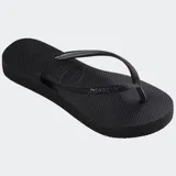 Ojotas Havaianas Slim Flatform Sparkle color gris con glitter en las tiras y suela lateral.