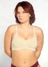 Soutien maternal de microfibra color blanco, sin costuras, sin aro ni copa, con breteles regulables y broches desmontables para amamantar.