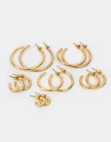 Set de seis pares de aros tipo argolla de metal dorado, en diferentes tamaños.