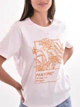 Remera blanca de algodón con estampado de limones y texto en azul.