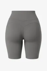 Calza corta gris de lycra con cintura alta y costuras laterales.