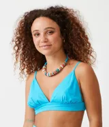 Blusa cropped de lino color celeste con tirantes finos ajustables y escote en V. Presenta elástico en la espalda.