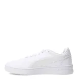 Championes Puma blancos de cuero sintético, con logo de la marca en el lateral.