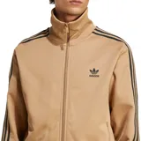 Campera Adidas Adicolor Classics Beckenbauer color beige con cierre frontal, cuello alto y tres rayas negras en las mangas.