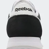 Championes Reebok Classic Nylon de hombre, color negro con detalles en blanco. Capellada de nylon y gamuza, entresuela de EVA y suela de goma.