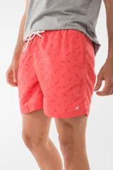 Short de baño azul con estampado de hojas de palmera en tonos azules, blancos y rosados.