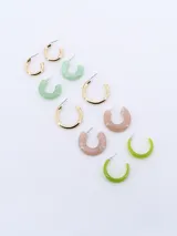 Set de aros de argolla gruesa en diferentes colores: dorado, verde claro, verde oscuro y beige.