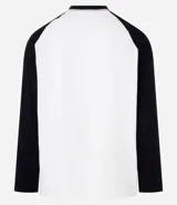 Remera masculina de algodón color blanco con mangas raglán negras, cuello redondo y estampa frontal de un gato con lettering "Chaos".