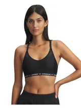 Top deportivo negro Under Armour con breteles finos regulables y espalda cruzada. Banda inferior elástica con logo Under Armour en blanco.