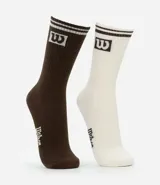 Kit de dos pares de medias deportivas Wilson, una azul y otra blanca, con logo y rayas en la parte superior.