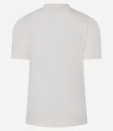 Remera blanca de corte slim con cuello redondo y mangas cortas abullonadas. Presenta un estampado frontal con diseño de picnic en tonos beige, con detalles bordados de abeja, cesta, hongo y texto en francés.