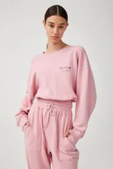 Pantalón de jogging negro de algodón, con cintura y tobillos elastizados, cordón de ajuste y bolsillos frontales con logo estampado.