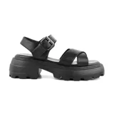 Sandalia de mujer color negro con tira cruzada y cierre ajustable, ideal para un look casual.