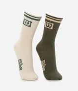 Kit de dos pares de medias deportivas Wilson, una azul y otra blanca, con logo y rayas en la parte superior.